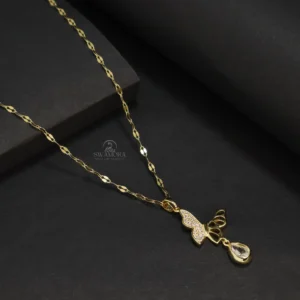 Introducing an exceptionally beautiful and delicate gold-plated necklace for women! This necklace features a charming butterfly pendant adorned with small, sparkling stones. Suspended below the butterfly is a lovely teardrop-shaped pendant, giving this necklace a special and elegant look. The chain is made from high-quality material, providing a beautiful golden shine and ensuring it lasts for a long time. Key Features: ⦁ Anti-tarnish: The high-quality gold plating prevents it from tarnishing quickly and helps maintain its golden shine. ⦁ Skin-friendly: This material is safe for your skin. ⦁ Long-lasting: The sturdy construction and good finish mean this necklace can be worn for a long time. ⦁ The delicate butterfly and teardrop pendant design gives it a special and attractive look. ⦁ A great fashion accessory and style statement for women. ⦁ An excellent option for any special occasion or to add a delicate touch to everyday style. This beautiful butterfly and teardrop pendant necklace will further enhance your beauty!