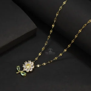 Introducing a beautiful and charming gold-plated sunflower pendant necklace for women! This necklace features a delicate sunflower pendant adorned with sparkling zircon crystals on its petals and center. The flower also has two small green leaves, enhancing its attractive appearance. This design gives the necklace a special and fresh look. The chain is made from high-quality material, providing a lovely golden shine and ensuring it lasts for a long time. Key Features: ⦁ Anti-tarnish: The high-quality gold plating prevents it from tarnishing quickly and helps maintain its golden shine. ⦁ Skin-friendly: This material is safe for your skin. ⦁ Long-lasting: The sturdy construction and good finish mean this chain can be worn for a long time. ⦁ The sunflower design with sparkling zircon crystals and leaf detail gives it a special and attractive look. ⦁ A great fashion accessory and style statement for women. ⦁ An excellent option for any special occasion or to add a beautiful and cheerful touch to everyday style. This beautiful sunflower pendant necklace will further enhance your beauty!